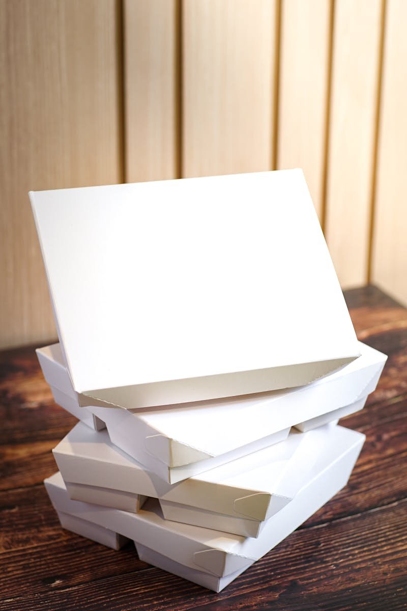 Tuck-top folding cartons