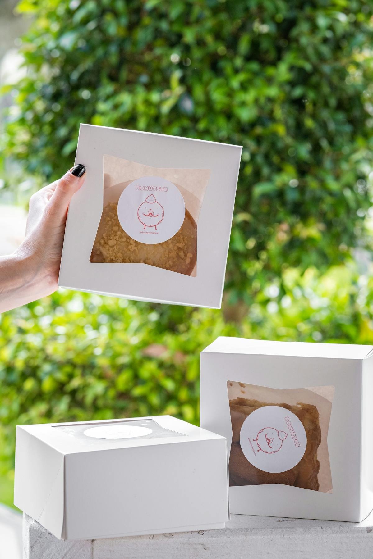 White bakery boxes with pastries