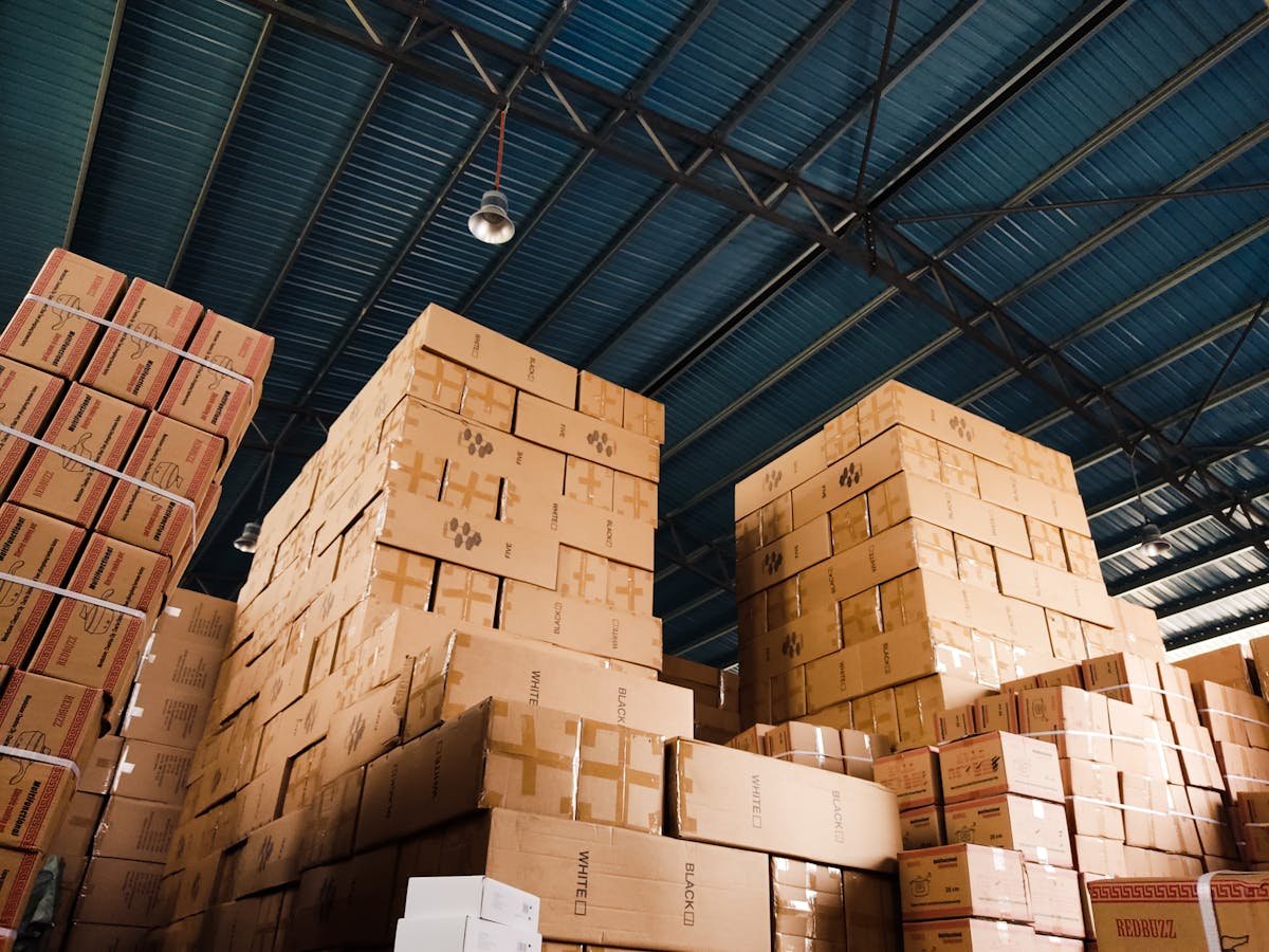 Corrugated shipping boxes stacked in warehouse